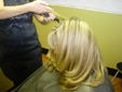 Pazazz Salon & Beauty Supply Customer getting hair cut